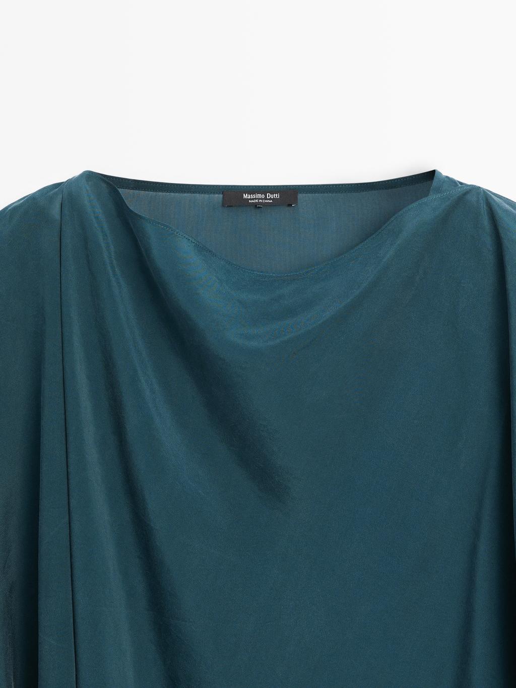 Flowing cape-style blouse