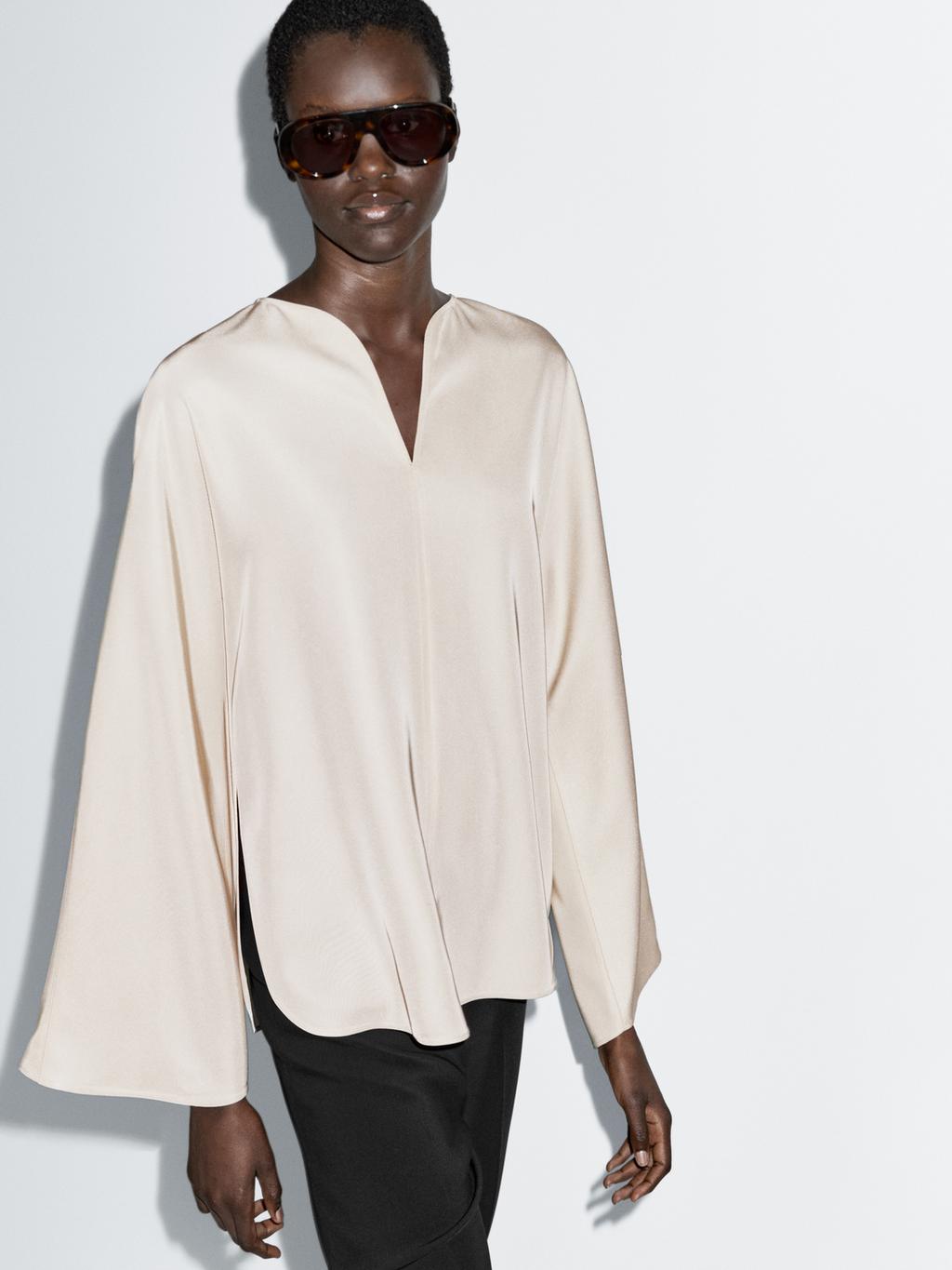 Flowing blouse with slit details