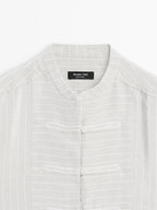 Striped oversize blouse with stand collar