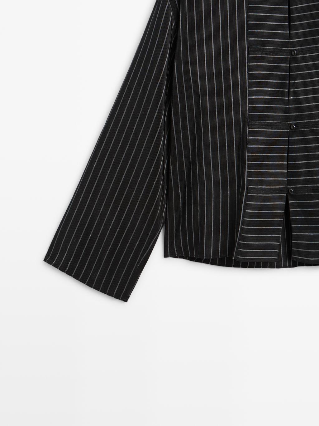 Striped shirt with stand collar and bib detail