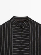 Striped shirt with stand collar and bib detail