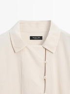 Flowing blouse with button detail