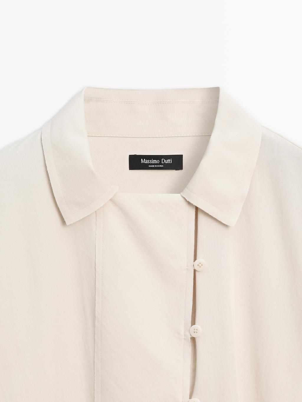 Flowing blouse with button detail