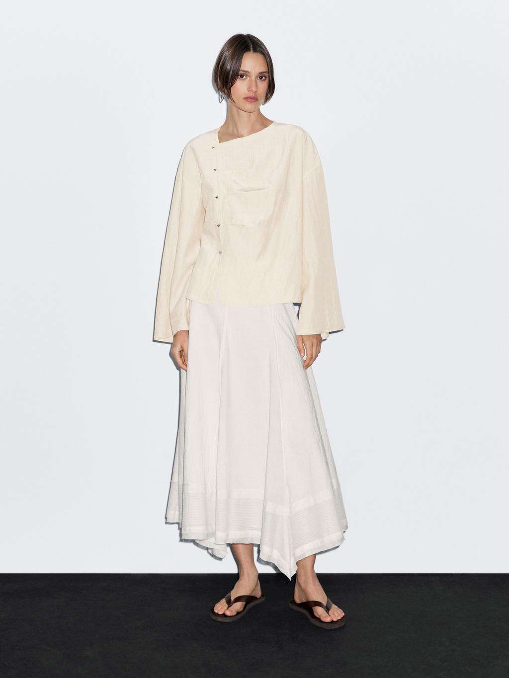 Long sleeve blouse with side button fastening