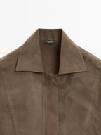 Blouse with zip on the chest