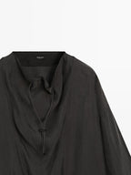 Flowing blouse with drawstring details