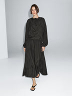 Flowing blouse with drawstring details