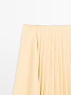 Asymmetric box pleat skirt