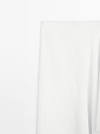 Asymmetric denim midi skirt