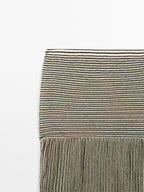 Long pleated skirt with flecked detail