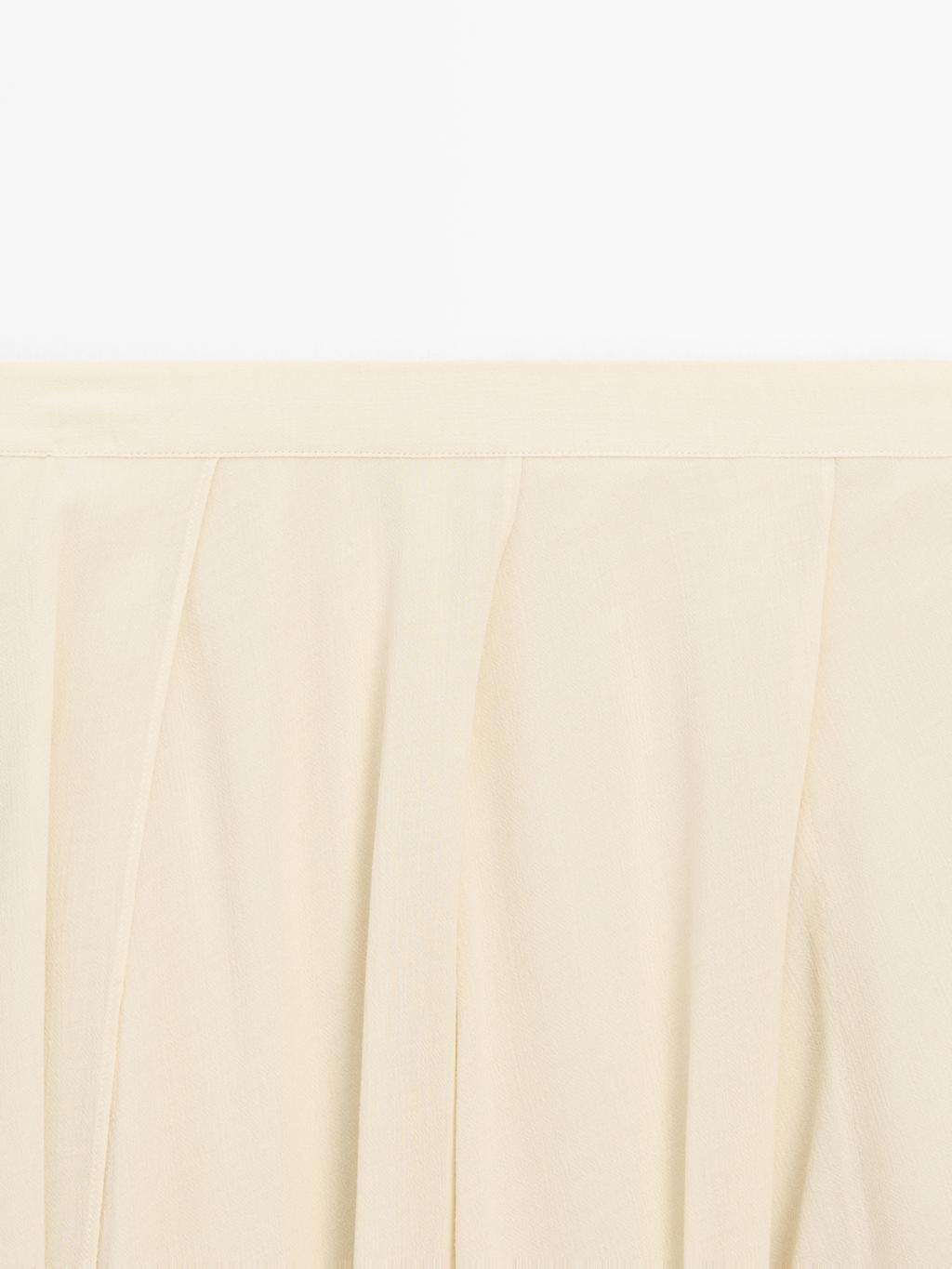 Flowing midi skirt with ruffles