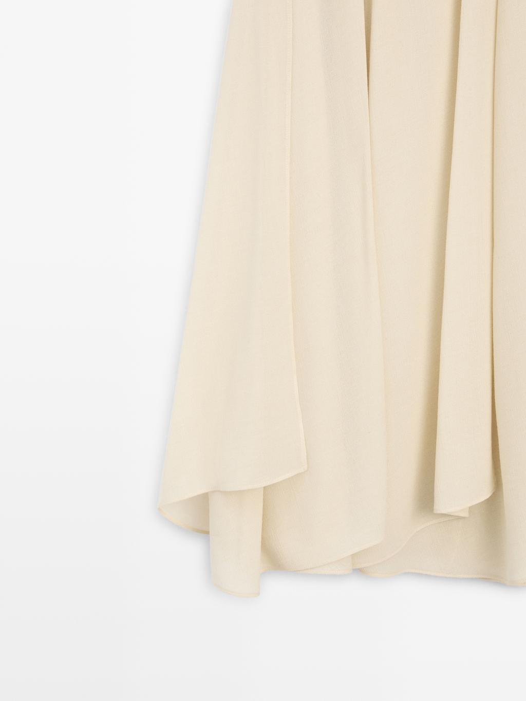 Flowing midi skirt with ruffles