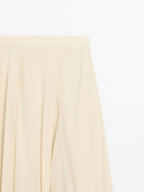 Flowing midi skirt with ruffles