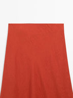 Long flared satin skirt