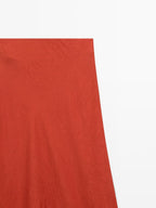 Long flared satin skirt