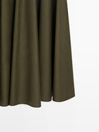 Flared midi skirt with sash belt