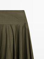 Flared midi skirt with sash belt