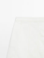 Short denim skirt with seam details