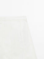 Short denim skirt with seam details