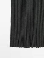 Pleated knit midi skirt