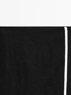 Midi skirt with contrast embroidery