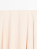 Flowing asymmetric midi skirt