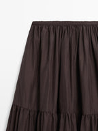 Long skirt with gathered detail