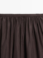 Long skirt with gathered detail