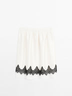Contrast lace-trimmed skirt