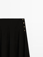 Long flared skirt with button details
