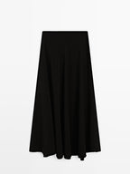 Long flared skirt with button details