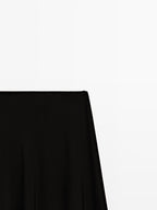 Long flared skirt with button details