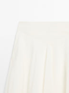 Midi skirt with yoke and flounce