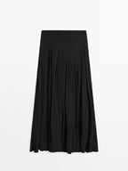 Flowing midi skirt with box pleats