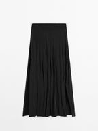 Flowing midi skirt with box pleats