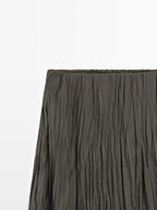 Long flowing pleated skirt