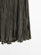 Long flowing pleated skirt
