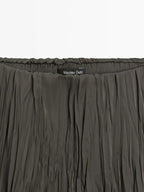 Long flowing pleated skirt
