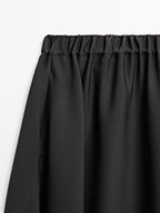 Flared midi skirt with elasticated waistband