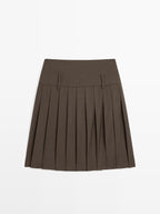 Short box pleat sash skirt