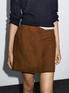 Suede leather mini skirt with topstitching