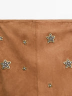 Suede leather skirt with rhinestone detail