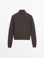 Knit sweater with shoulder detail