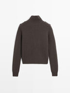 Knit sweater with shoulder detail