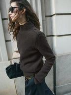 Knit sweater with shoulder detail
