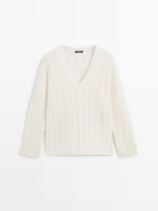 Cable-knit V-neck sweater