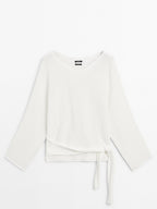 Knit sweater with bow detail