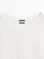 Knit sweater with bow detail