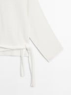 Knit sweater with bow detail