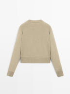 Knit cardigan with raglan sleeves